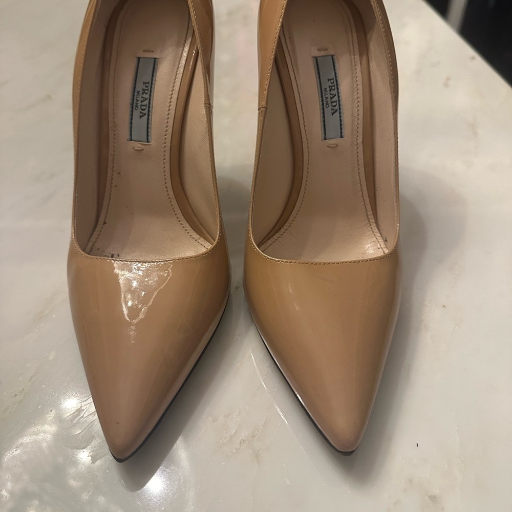 100% authentic Prada neutral high heels .